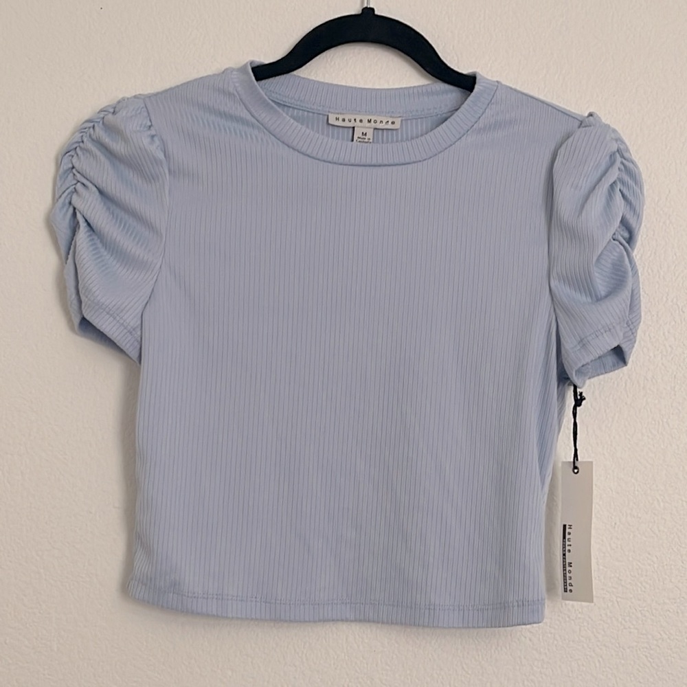 Light blue top